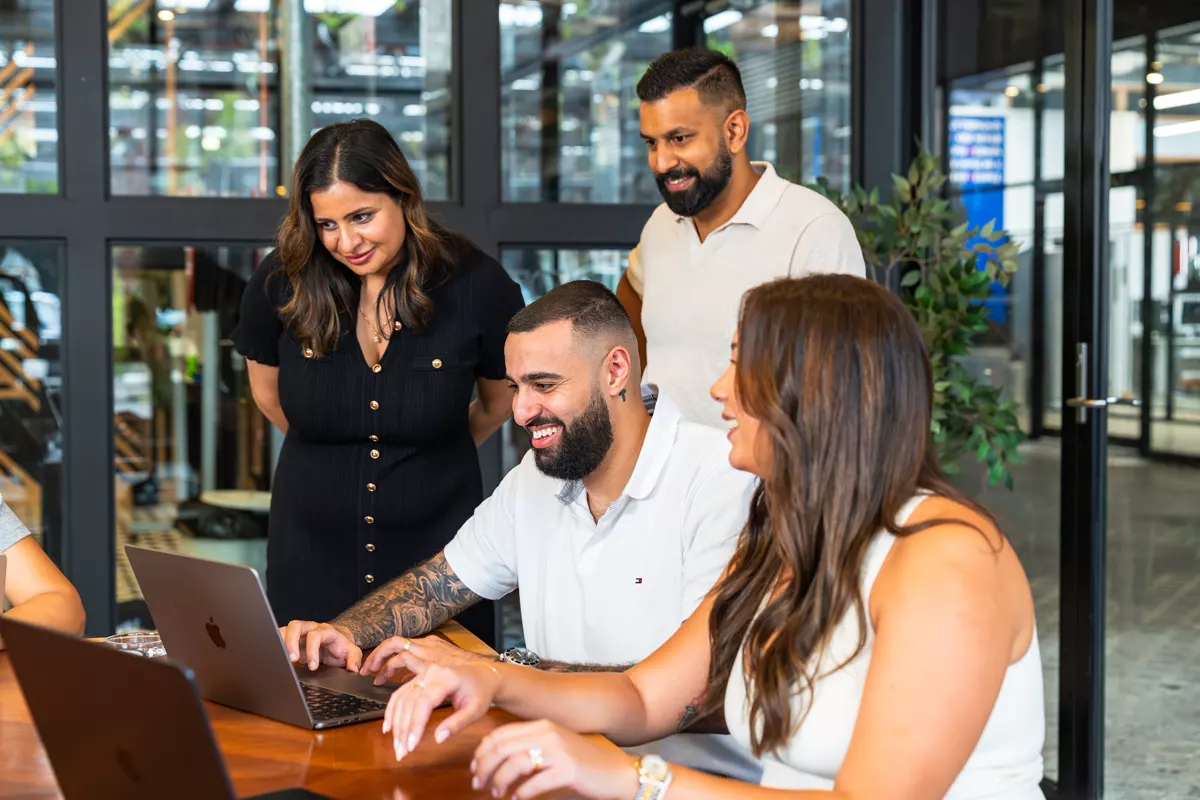 InvestorMate team members working through a purchase together